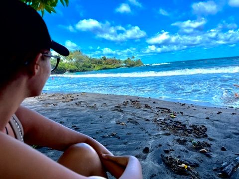 Kris Bradley enjoying a quiet moment on a Maui beach.